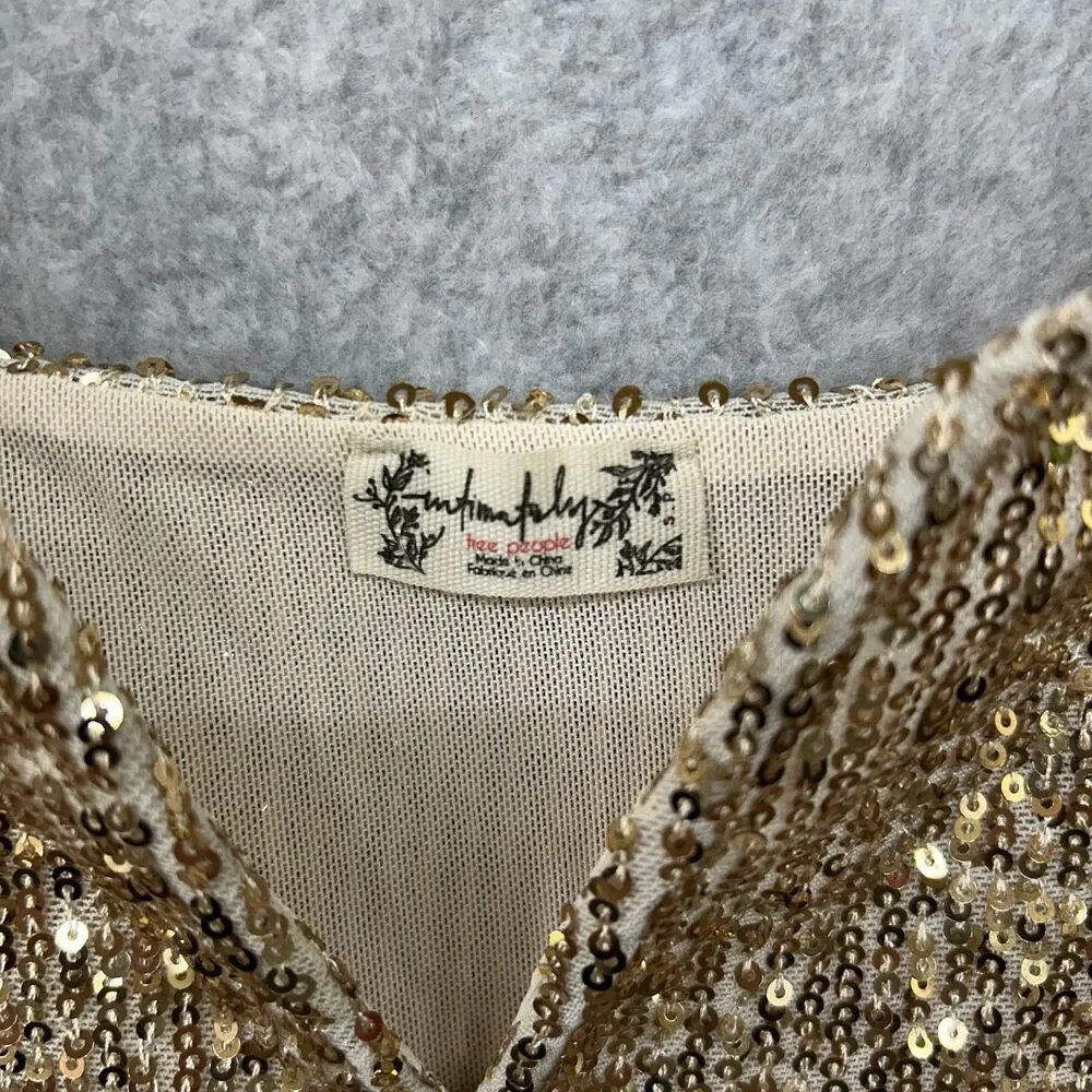 FREE PEOPLE Size Small intimately sparks fly sequin thong bodysuit in Gold