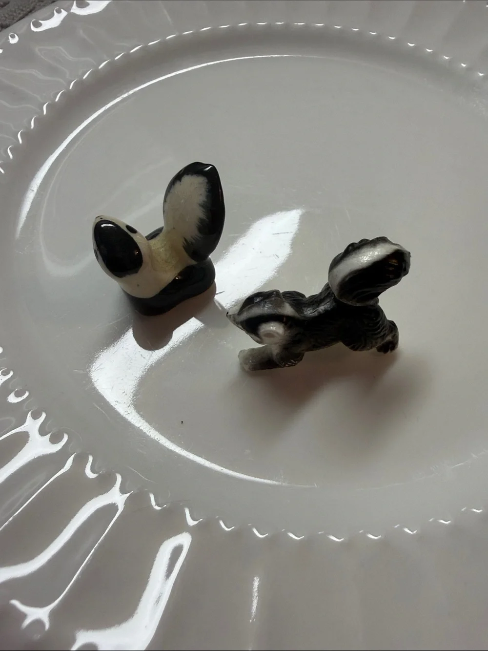 Vintage Miniature Ceramic Skunk Figurines