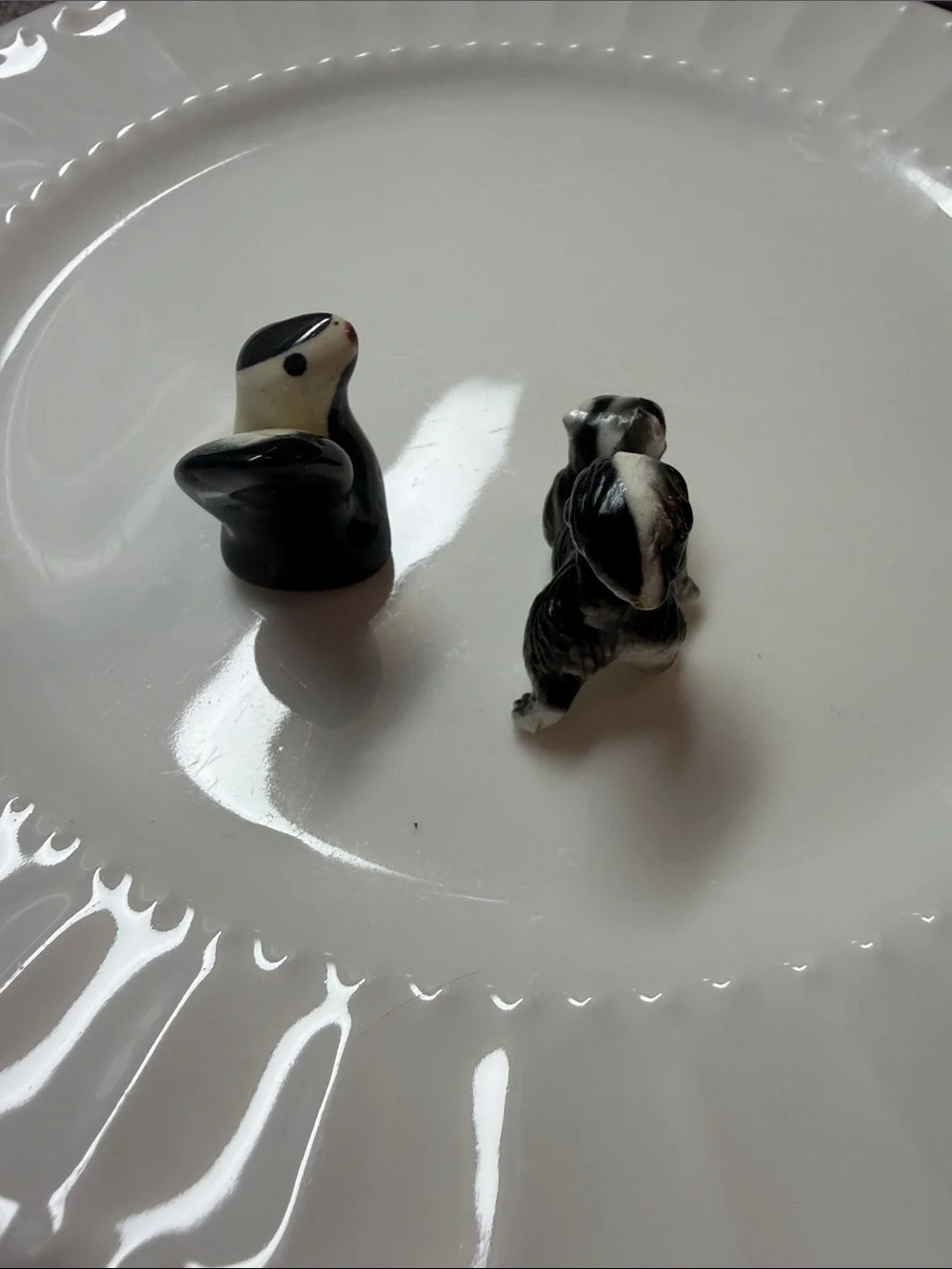Vintage Miniature Ceramic Skunk Figurines