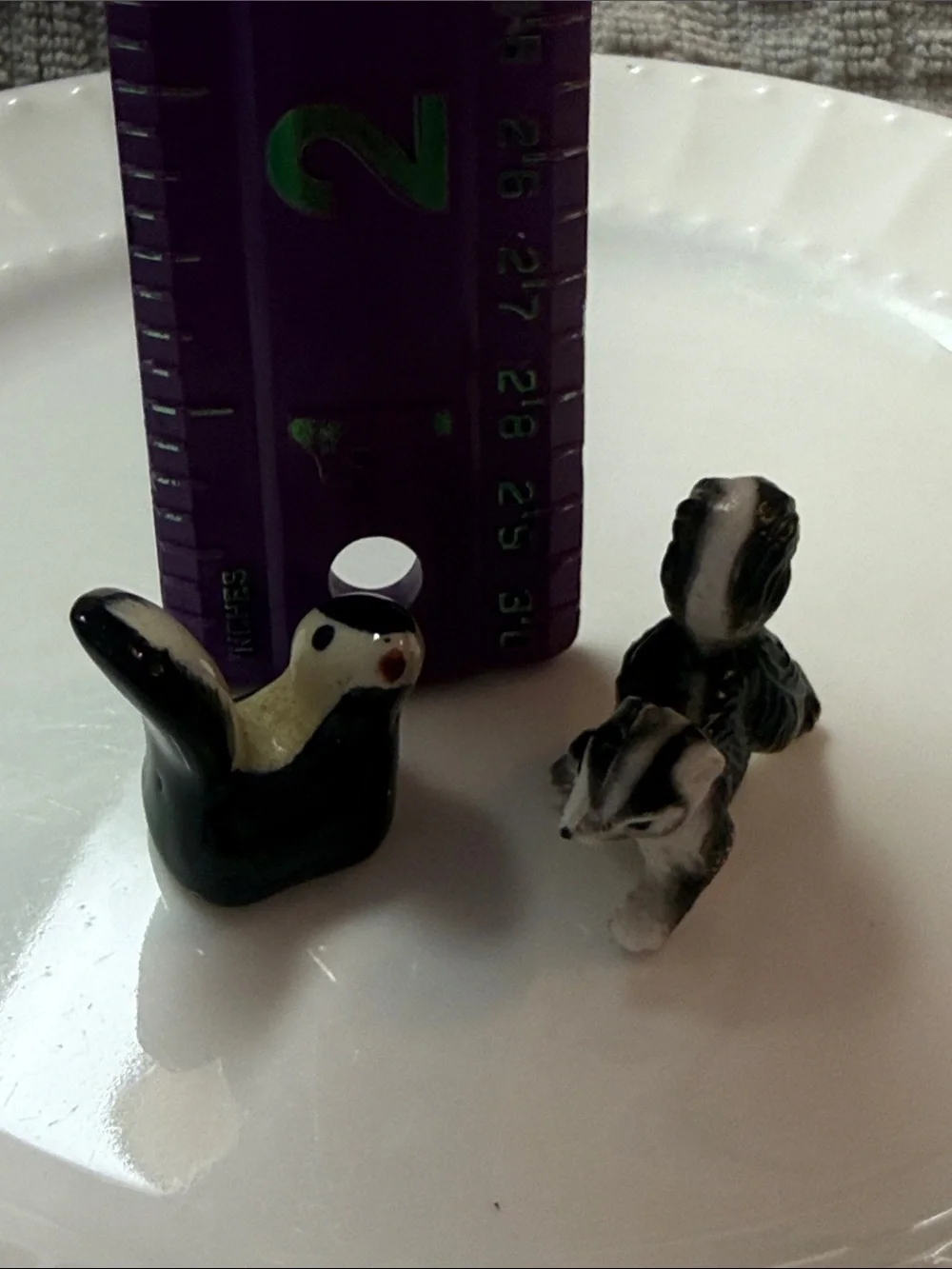 Vintage Miniature Ceramic Skunk Figurines