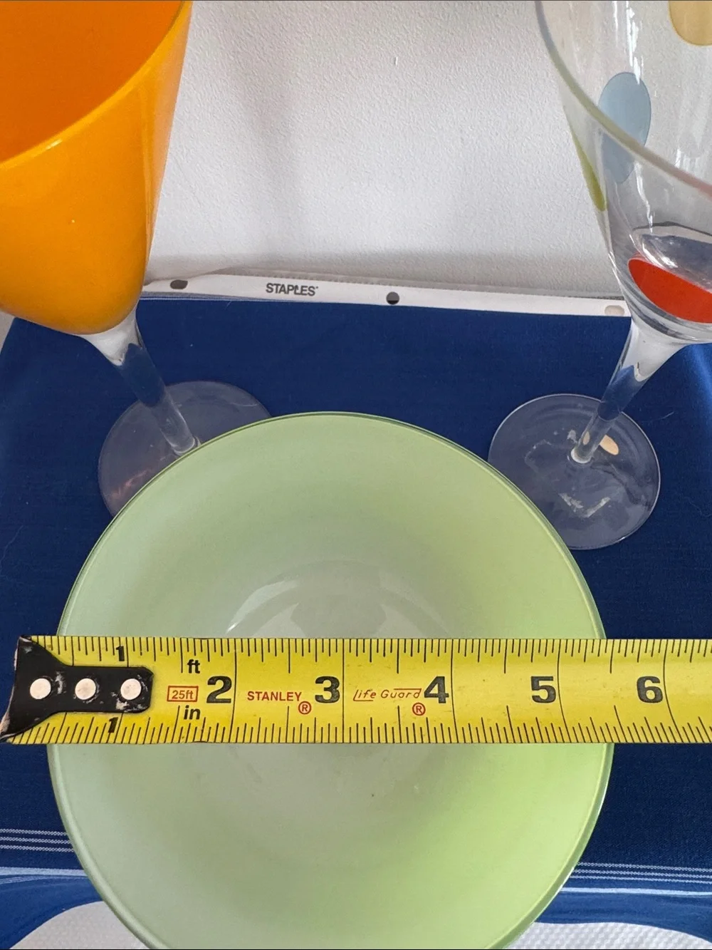 Martini bar set, 2 martini glasses, ice bucket, and 7 stirrers.