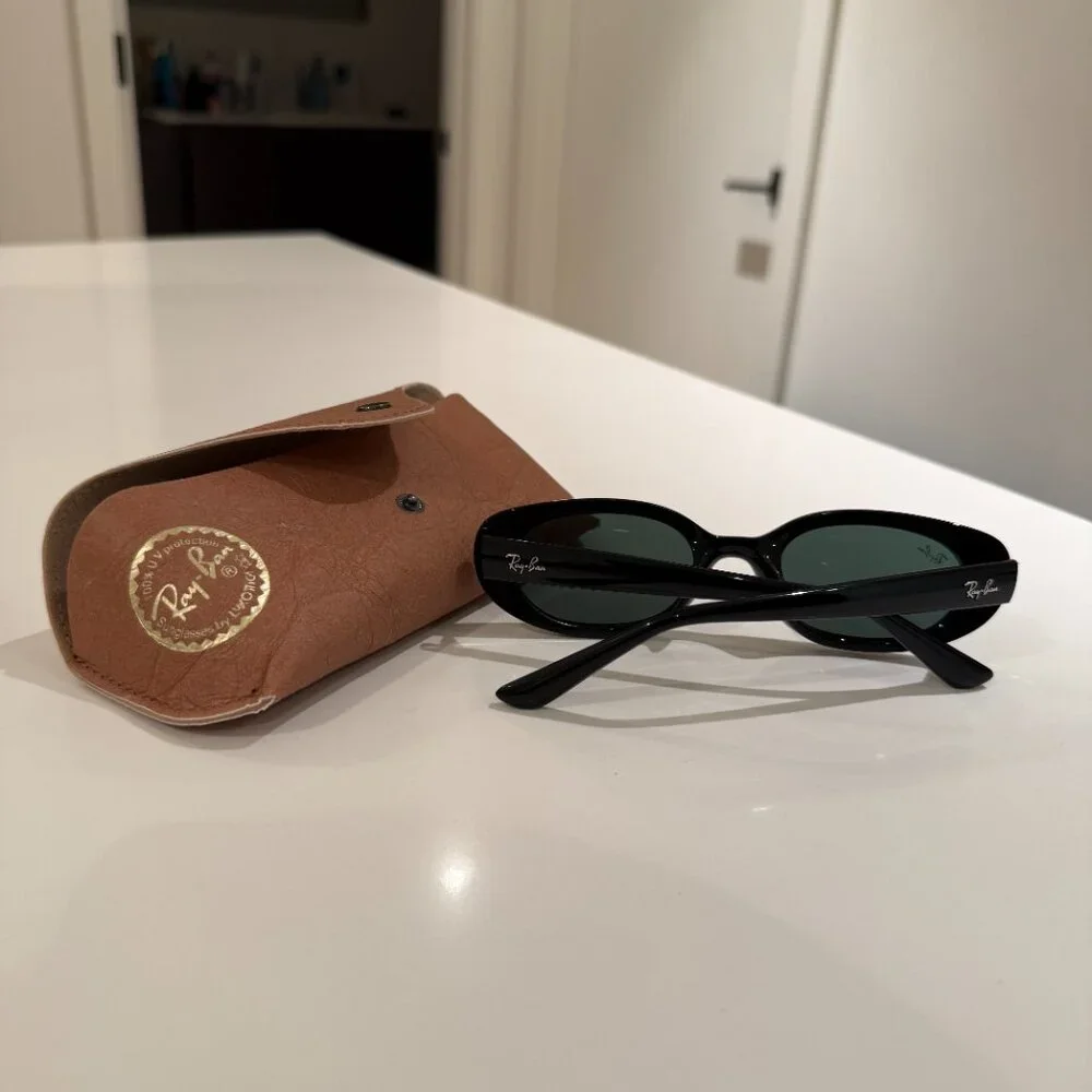 Ray-Ban Black Oval Sunglasses with Dark Green Lenses